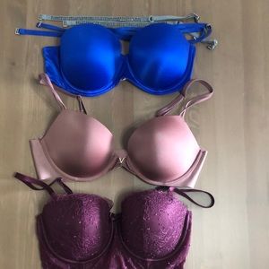34C Victorias Secret Bras. Burgundy lace, mauve signature bra, and blue bra
